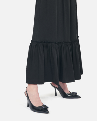 Black leather slingback pumps