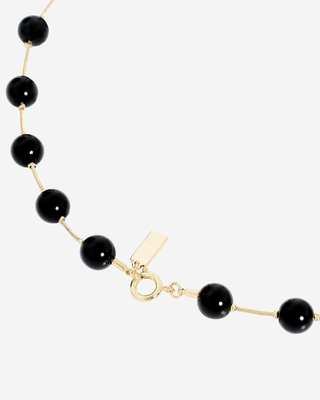 Pearl necklace with orange pendant
