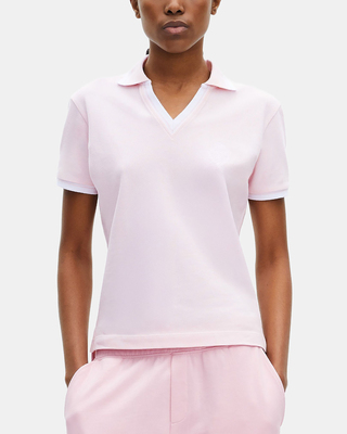 Polo col V rose pâle