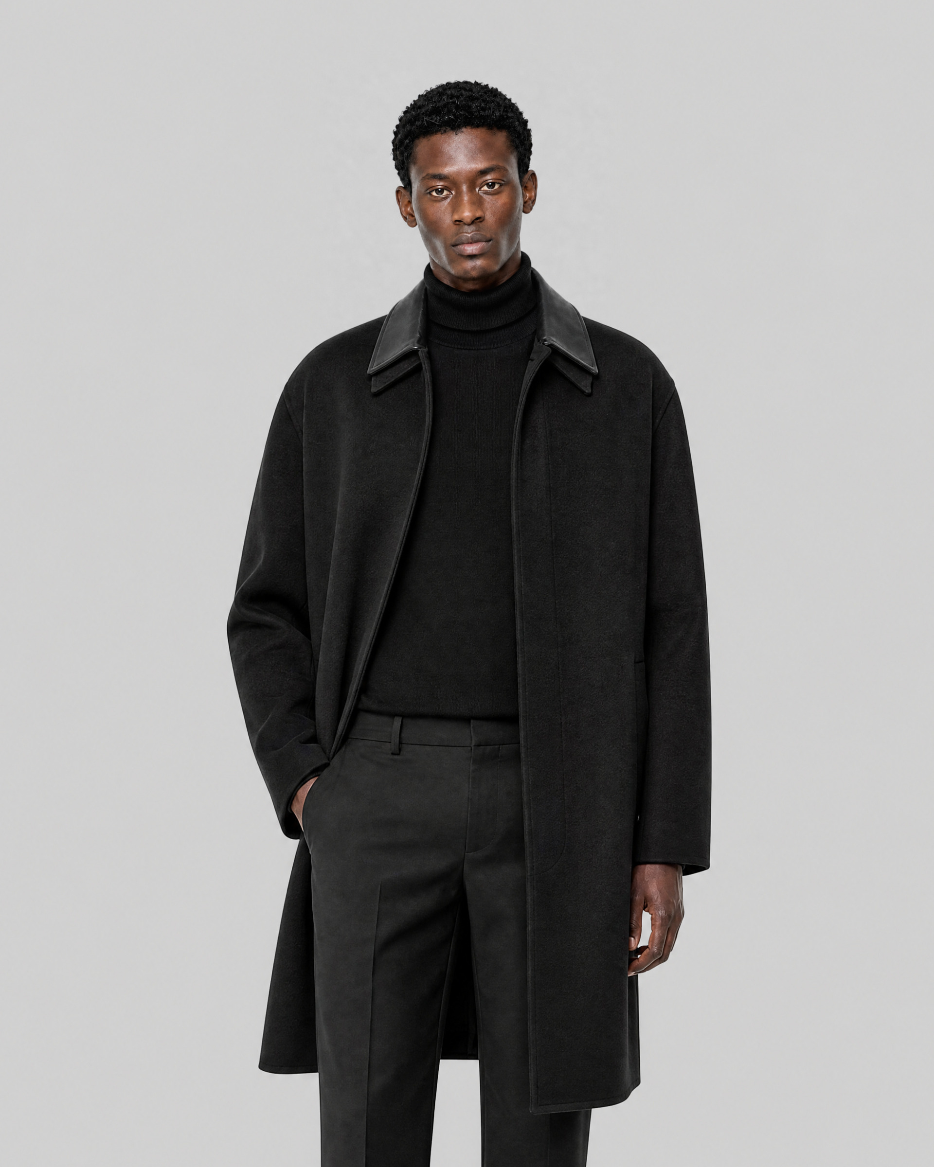 Manteau col cuir noir