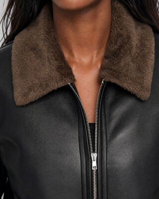 Blouson en fausse fourrue reversible kaki et noir