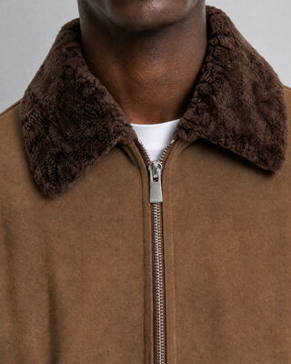 Blouson en fausse fourrure marron