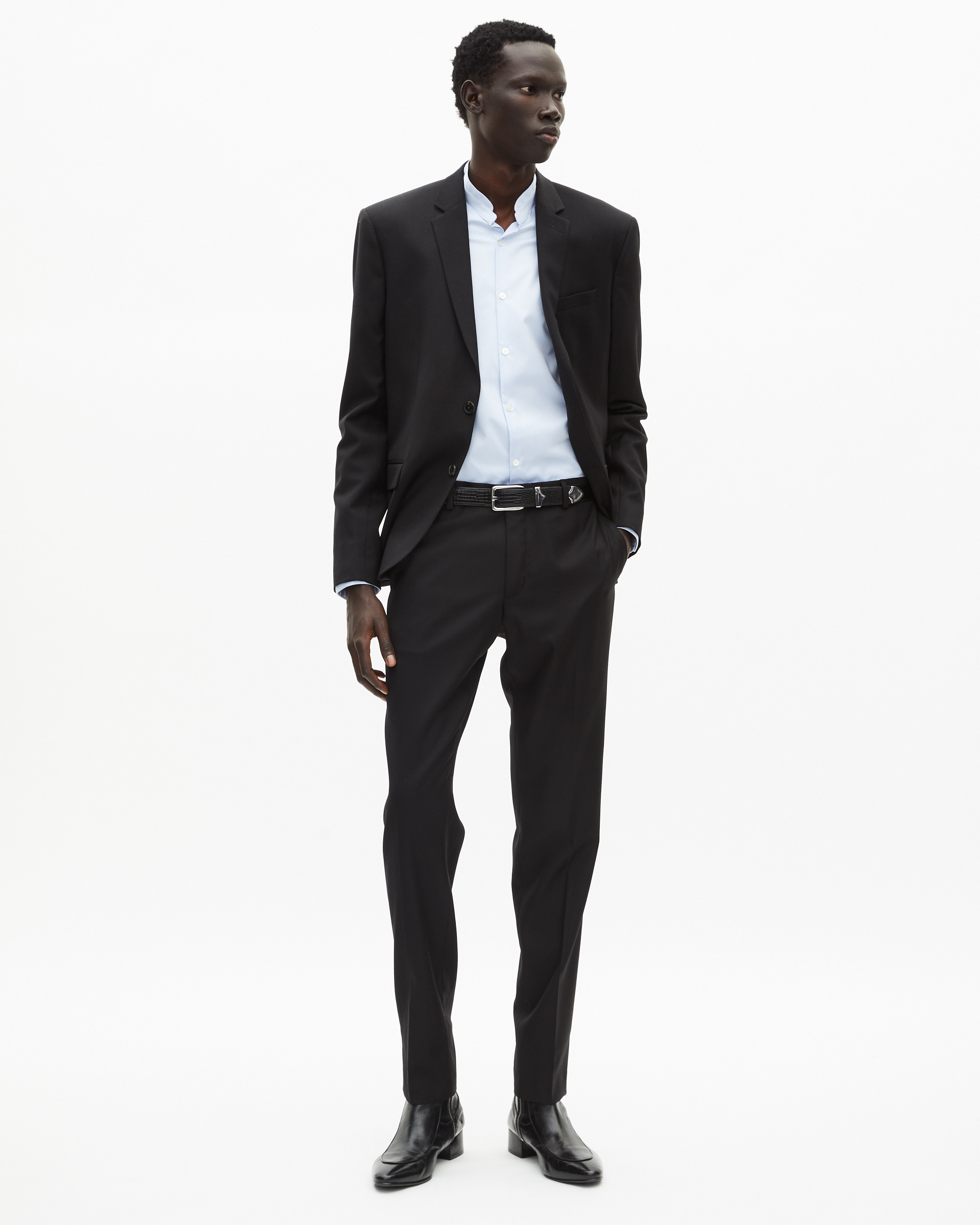 Veste de costume en laine noire coupe tailleur ajustée