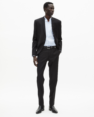 Veste de costume en laine noire coupe tailleur ajustée