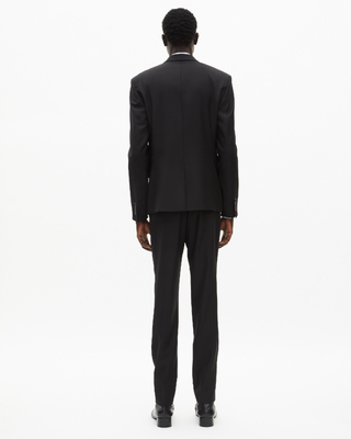 Veste de costume en laine noire coupe tailleur ajustée