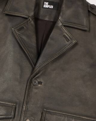 Blouson boutonné en cuir noir