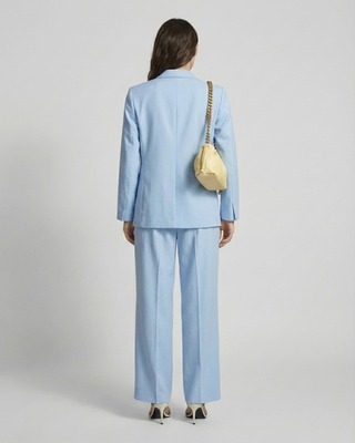 Pantalon de tailleur à pinces large en lin et coton bleu pastel