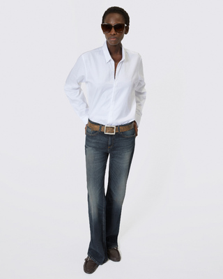 Jean bootcut avec abrasions bleu