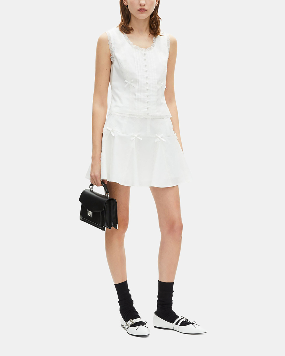 Short skirt with bow detail in ecru