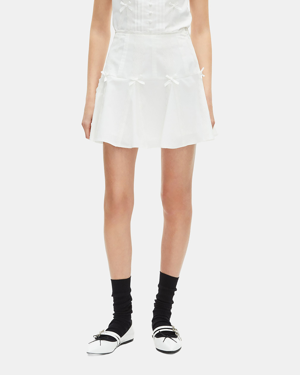 Short skirt with bow detail in ecru