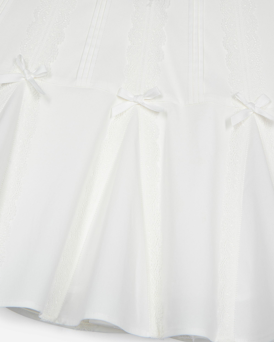 Short skirt with bow detail in ecru