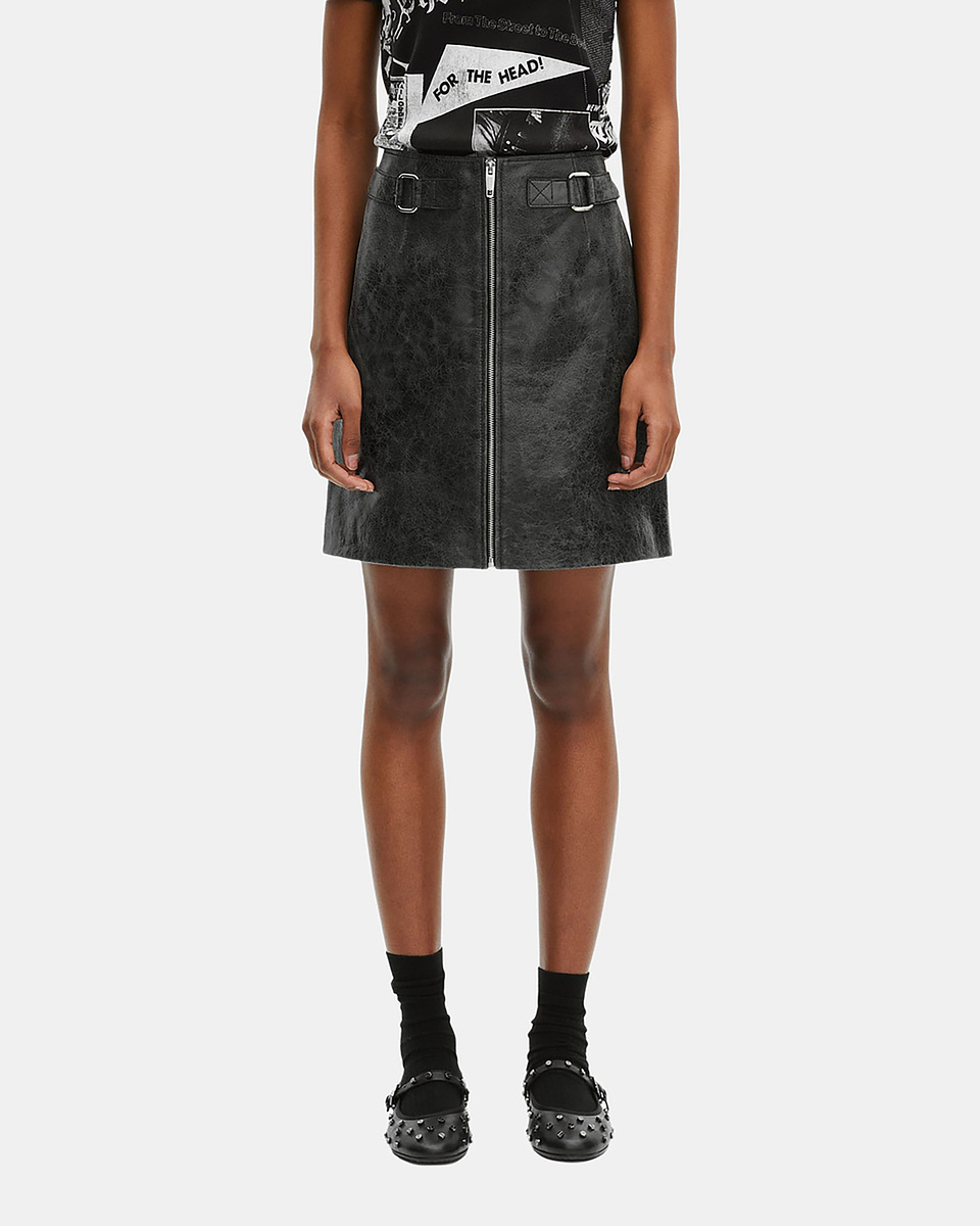 Black leather zipped short skirt