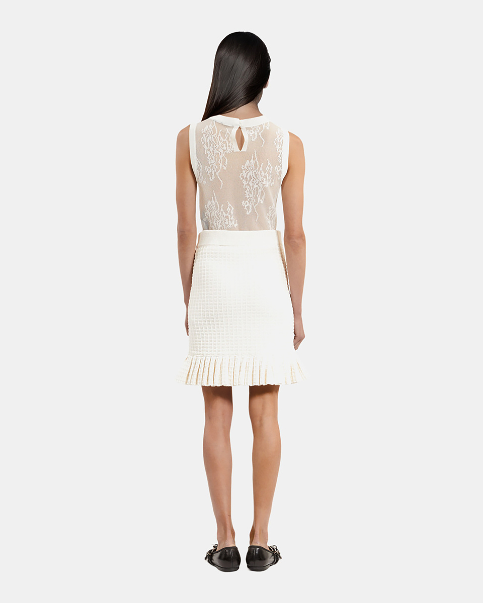 Short ecru knit skirt