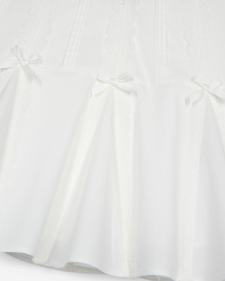 Short skirt with bow detail in ecru