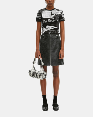 Black leather zipped short skirt