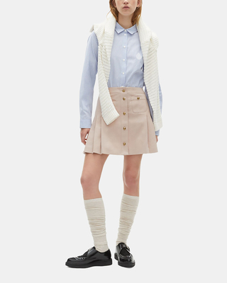 Short pleated skirt in light pink