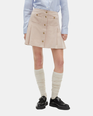 Short pleated skirt in light pink