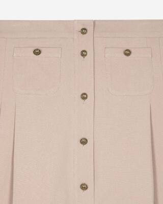 Short pleated skirt in light pink
