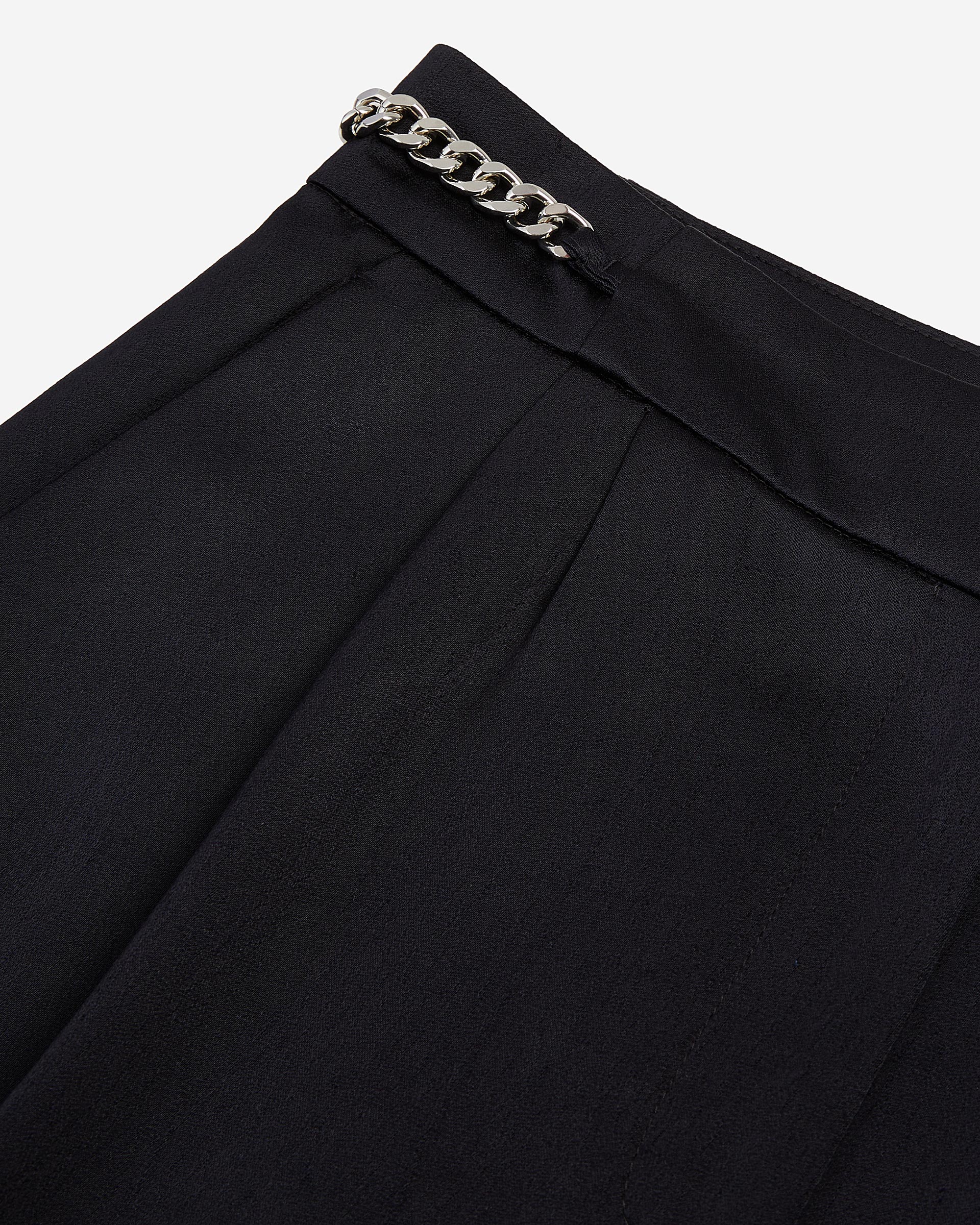 Navy blue trousers with chains