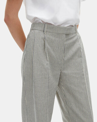 Loose-fitting striped pants in white cotton and linen