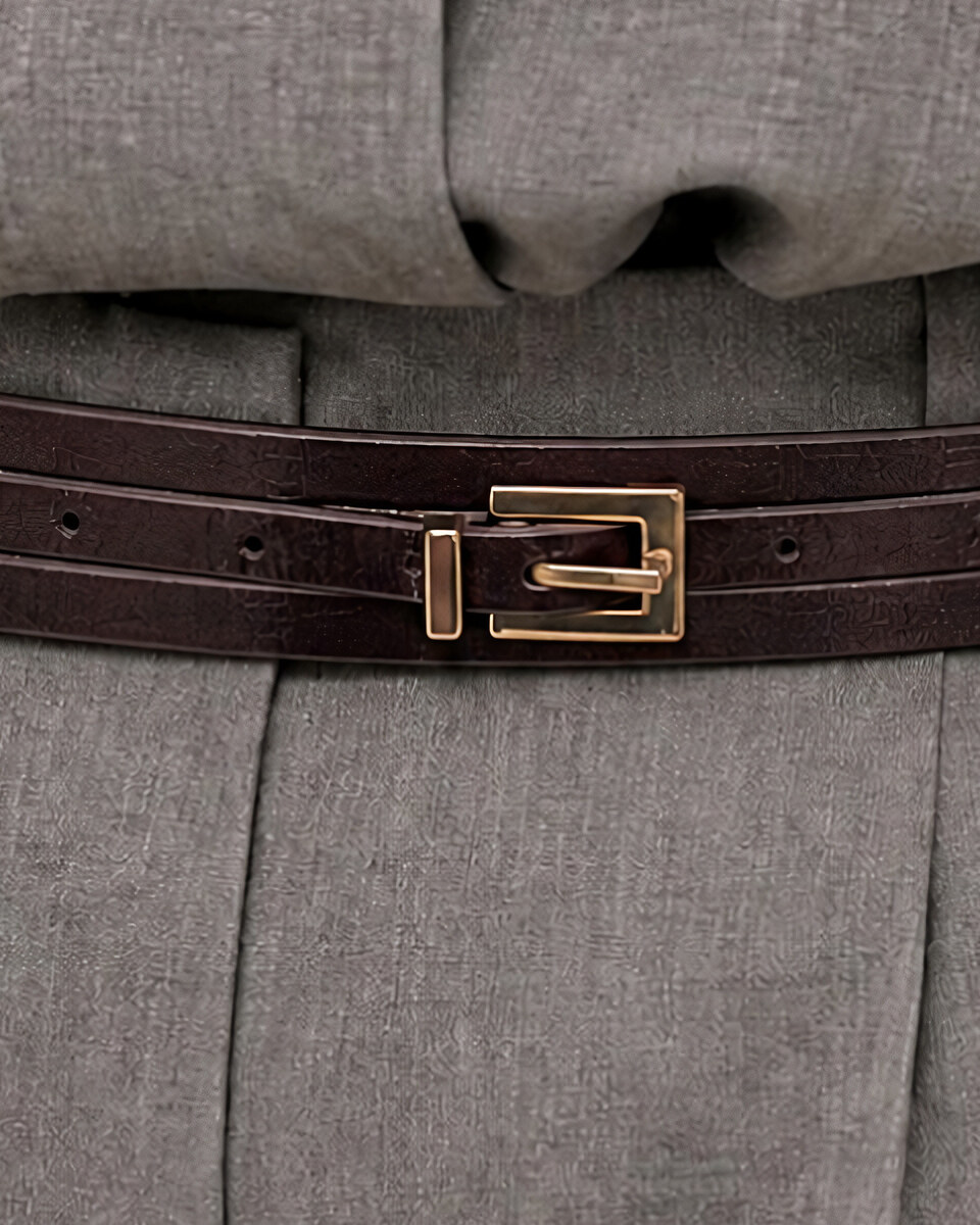 Thin brown leather belt with an eel-like texture