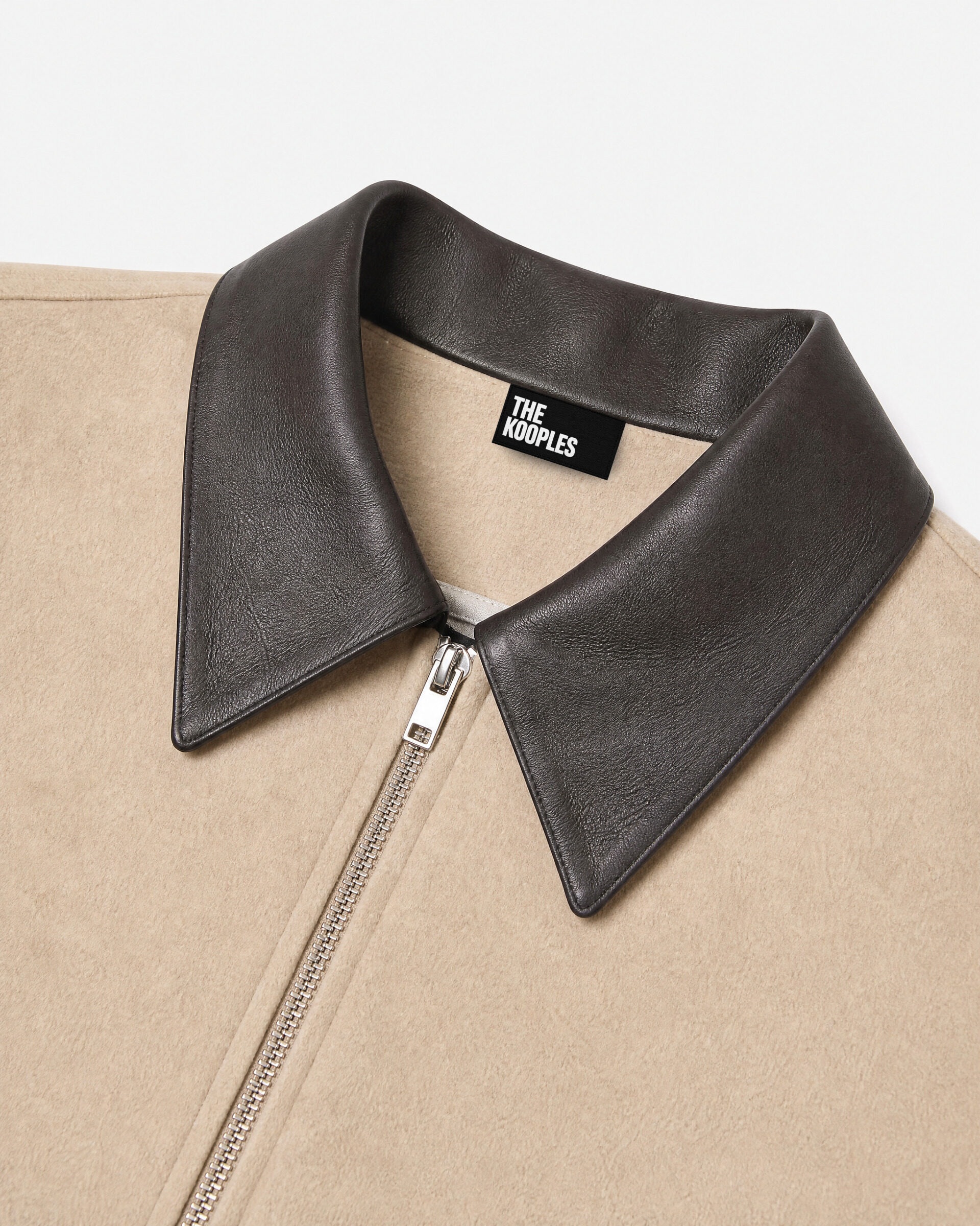 Reversible wool jacket with a beige leather collar