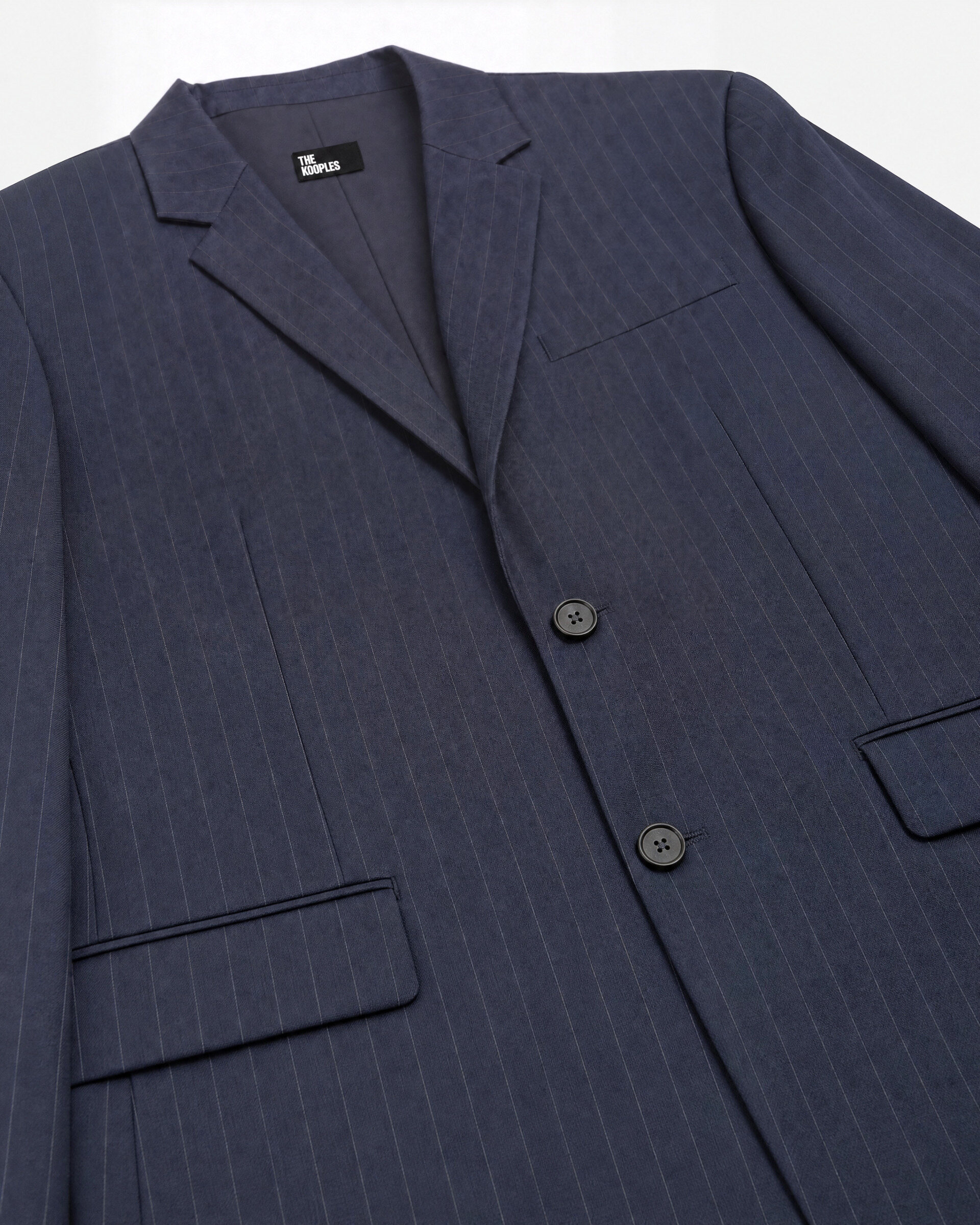 Loose-fitting wool blazer with a fine navy stripe pattern