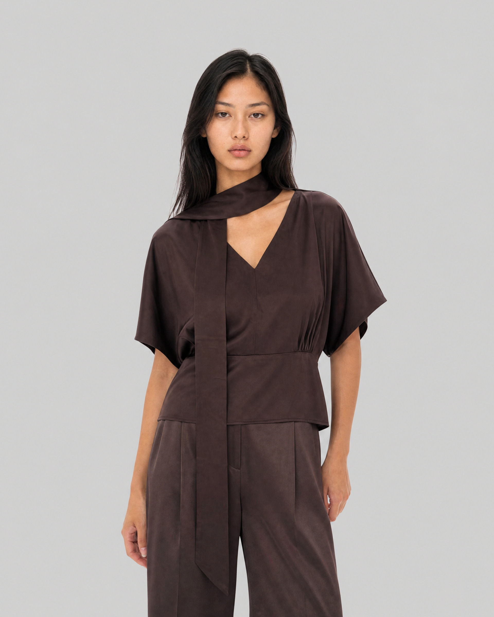 Top with a brown satin cravat