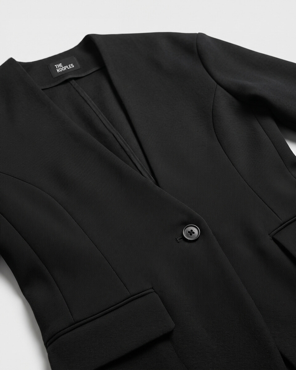 Black collarless wool jacket