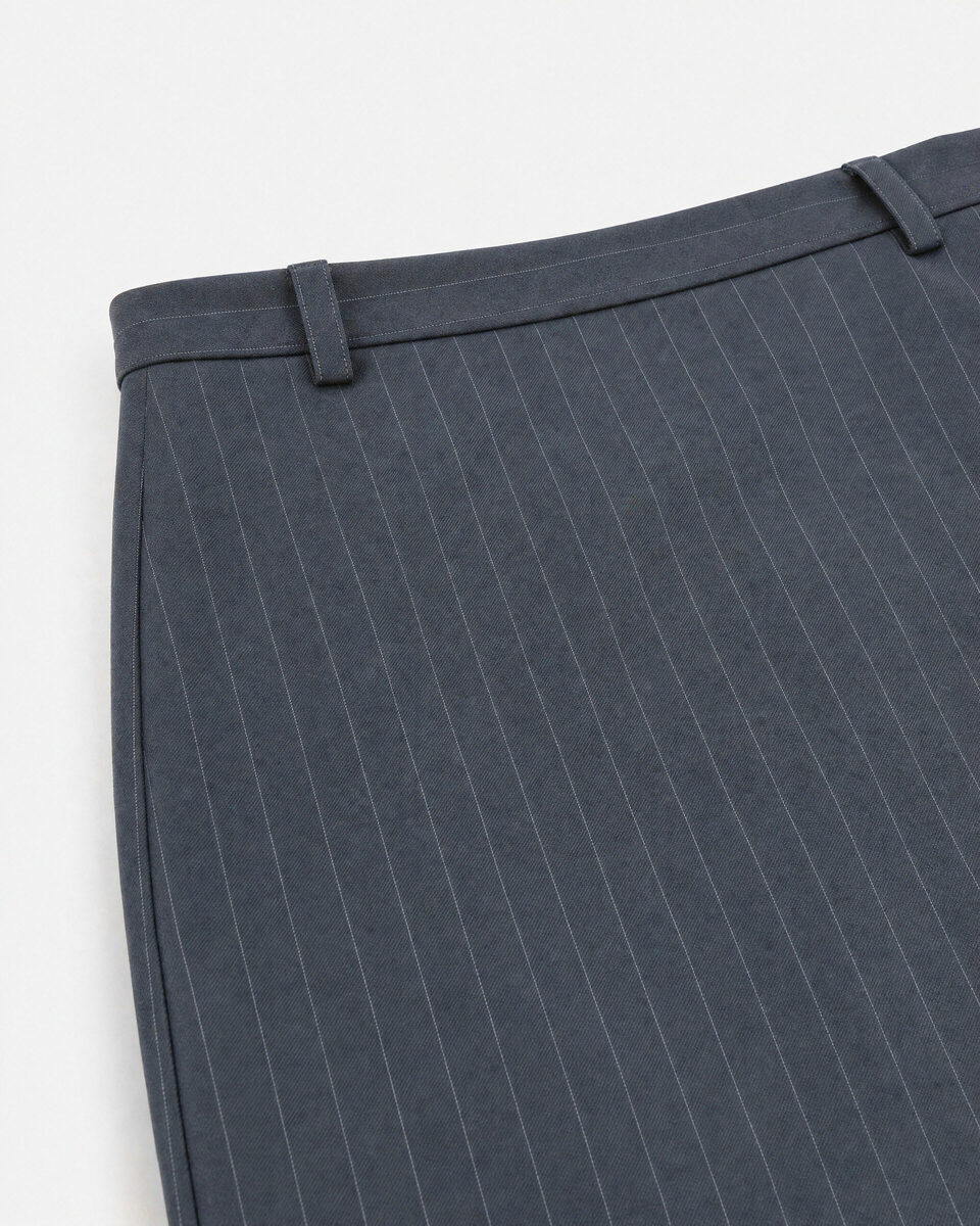Short wool skirt with a navy fine-striped pattern 