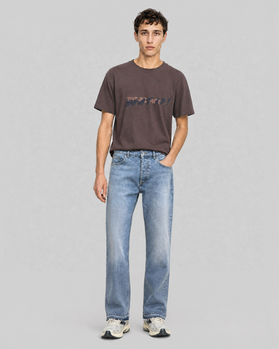 Light blue straight-leg jeans with raw-edge hems