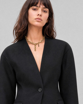 Black collarless wool jacket