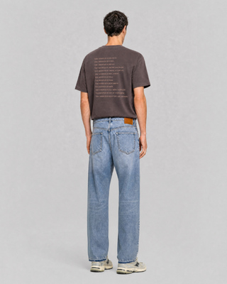 Light blue straight-leg jeans with raw-edge hems