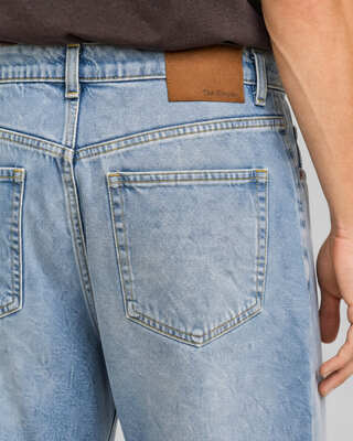 Light blue straight-leg jeans with raw-edge hems