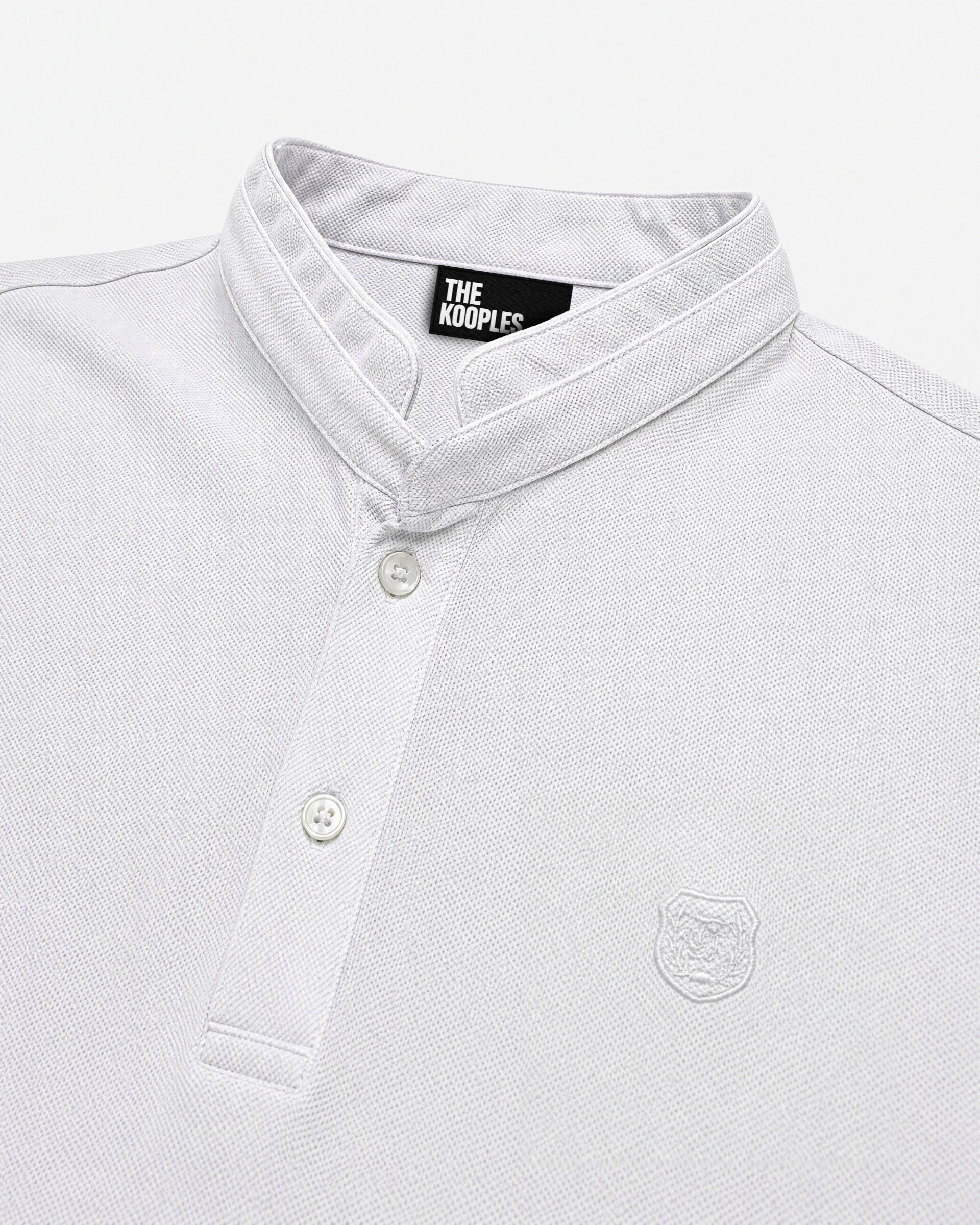 White polo shirt with a stand-up collar