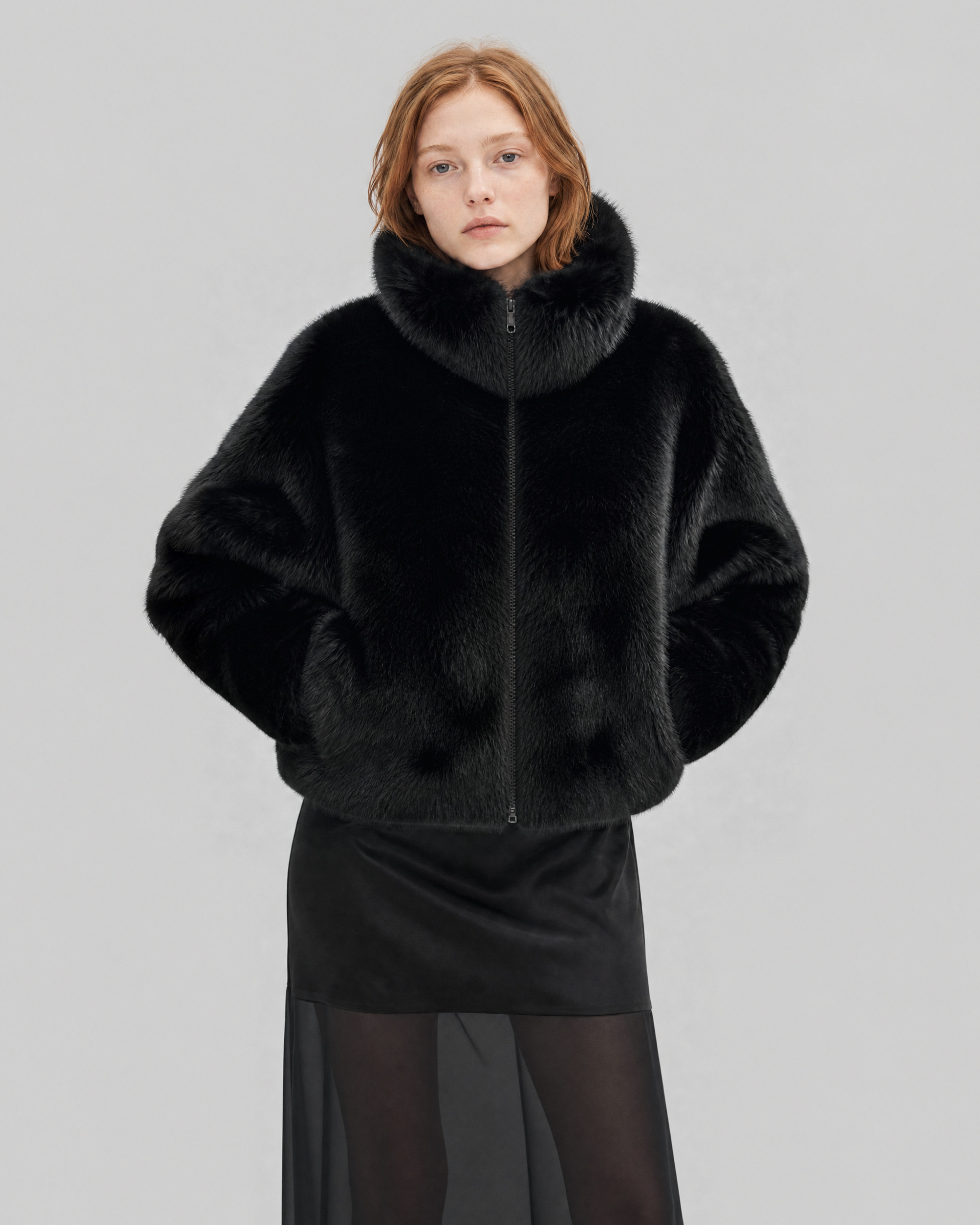 Black faux fur coat with a high collar