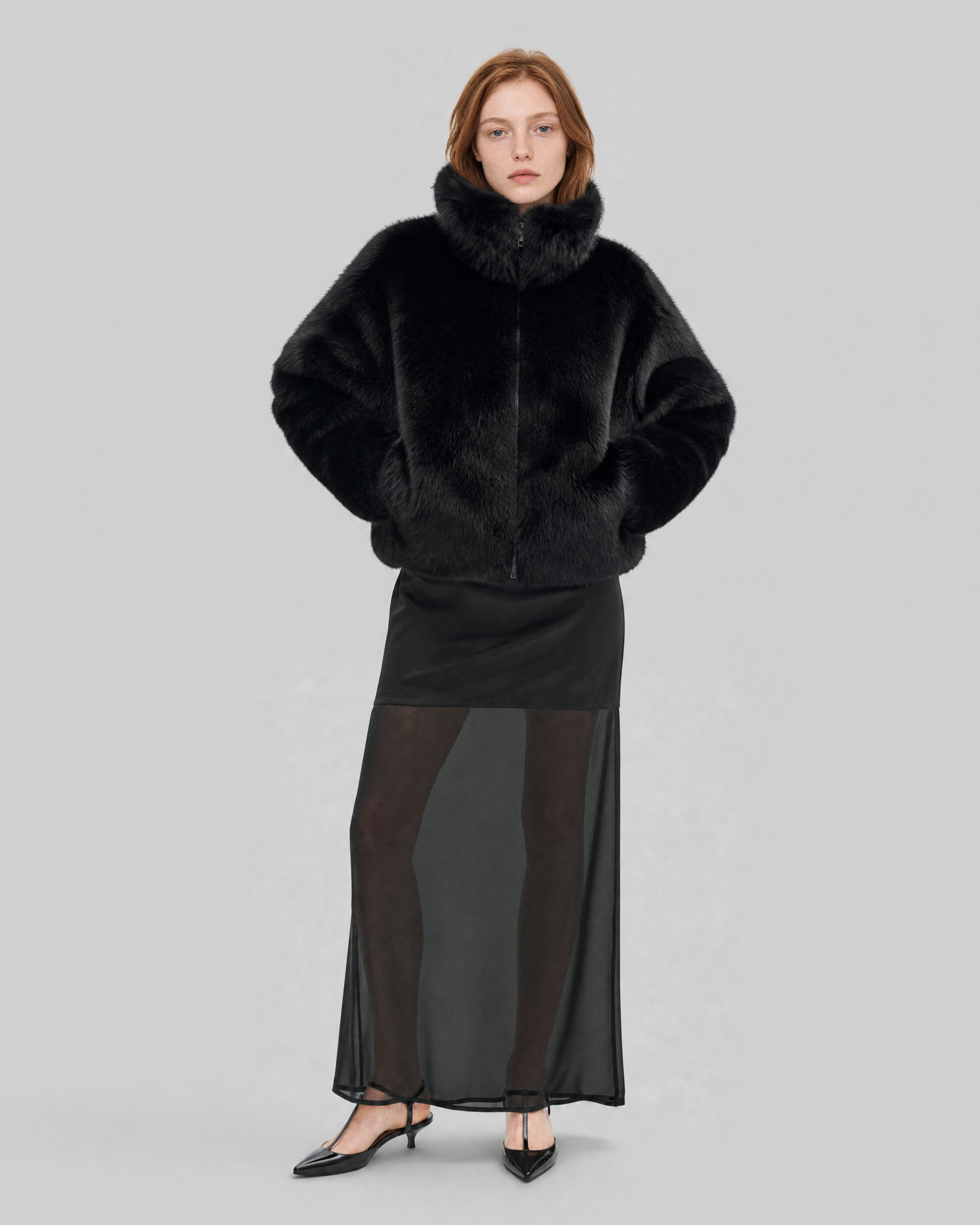 Black faux fur coat with a high collar