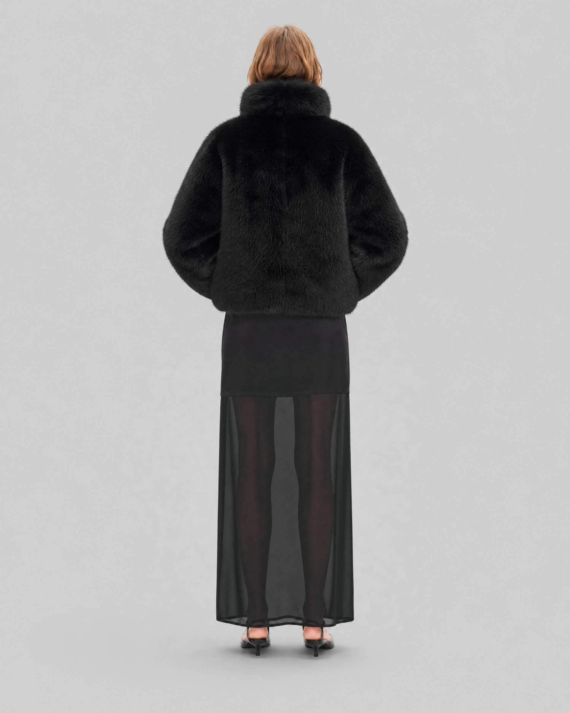 Black faux fur coat with a high collar