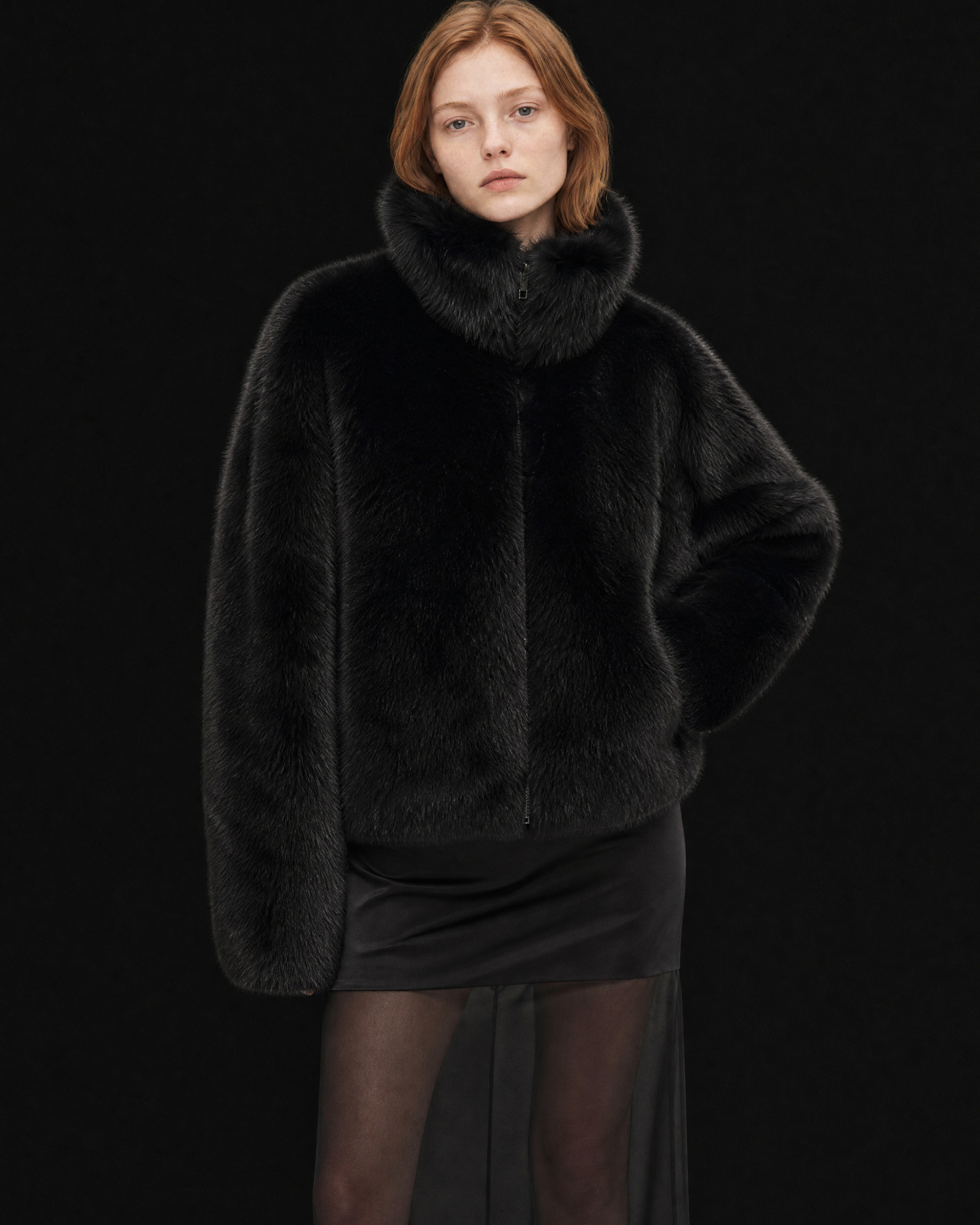 Black faux fur coat with a high collar