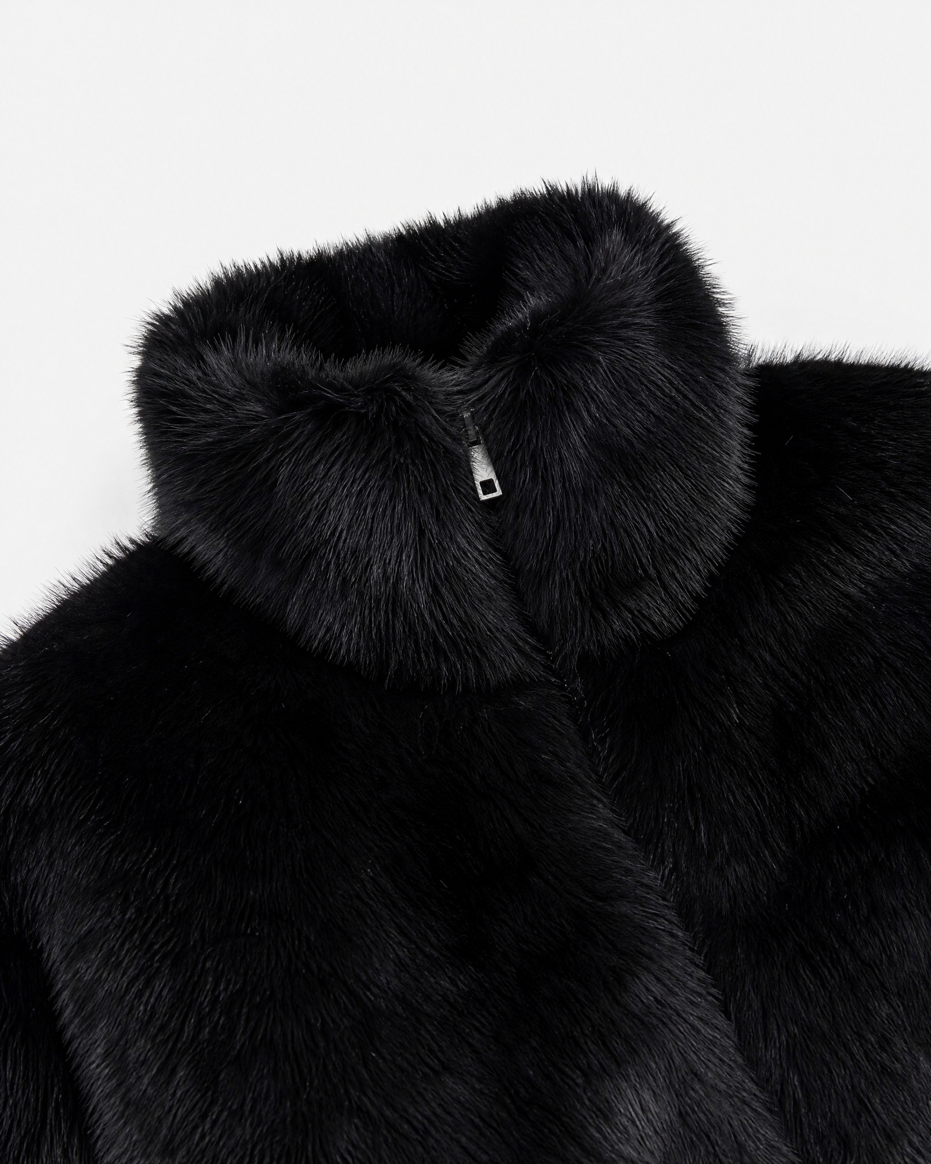 Black faux fur coat with a high collar