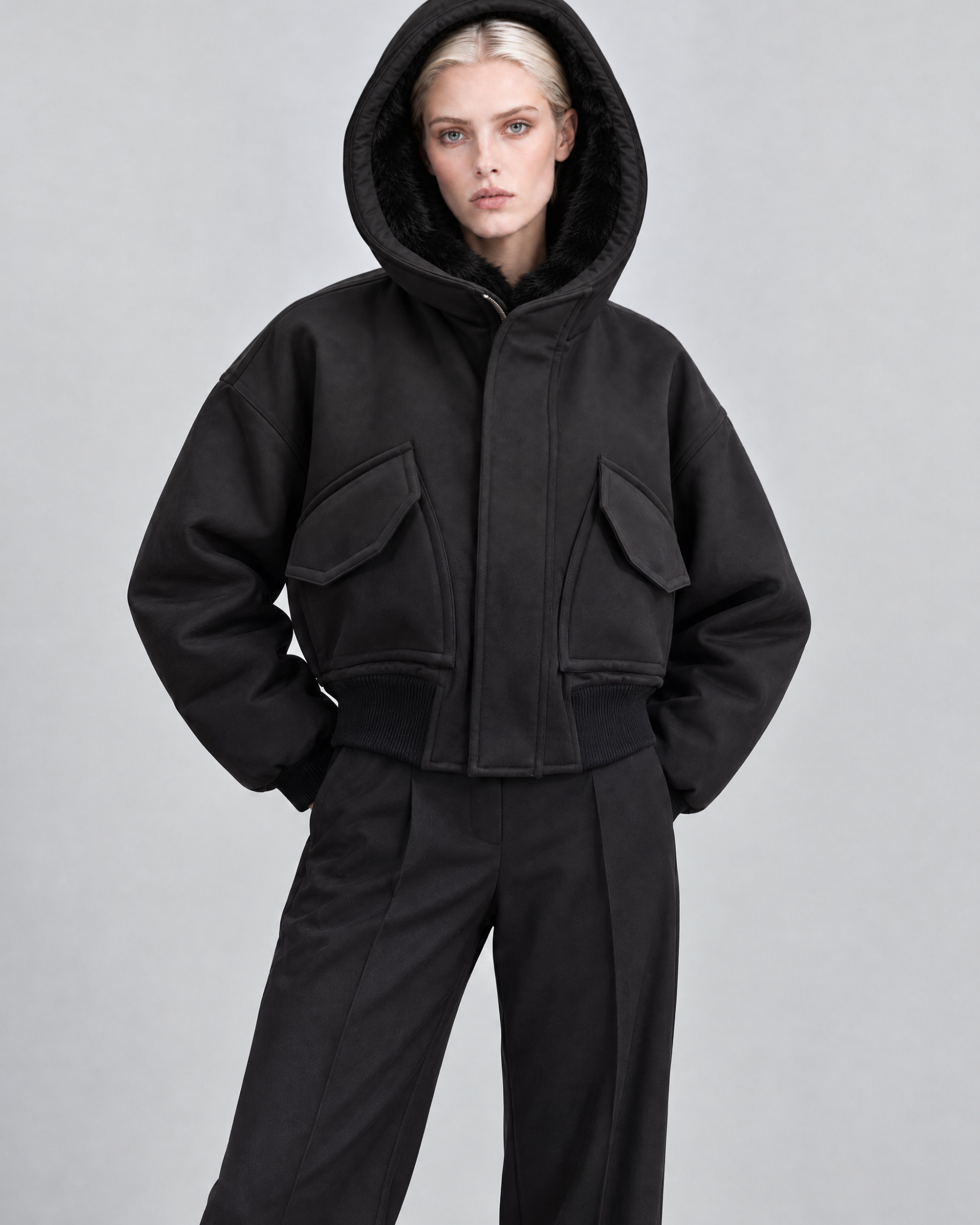 Black zip-up jacket with faux fur collar