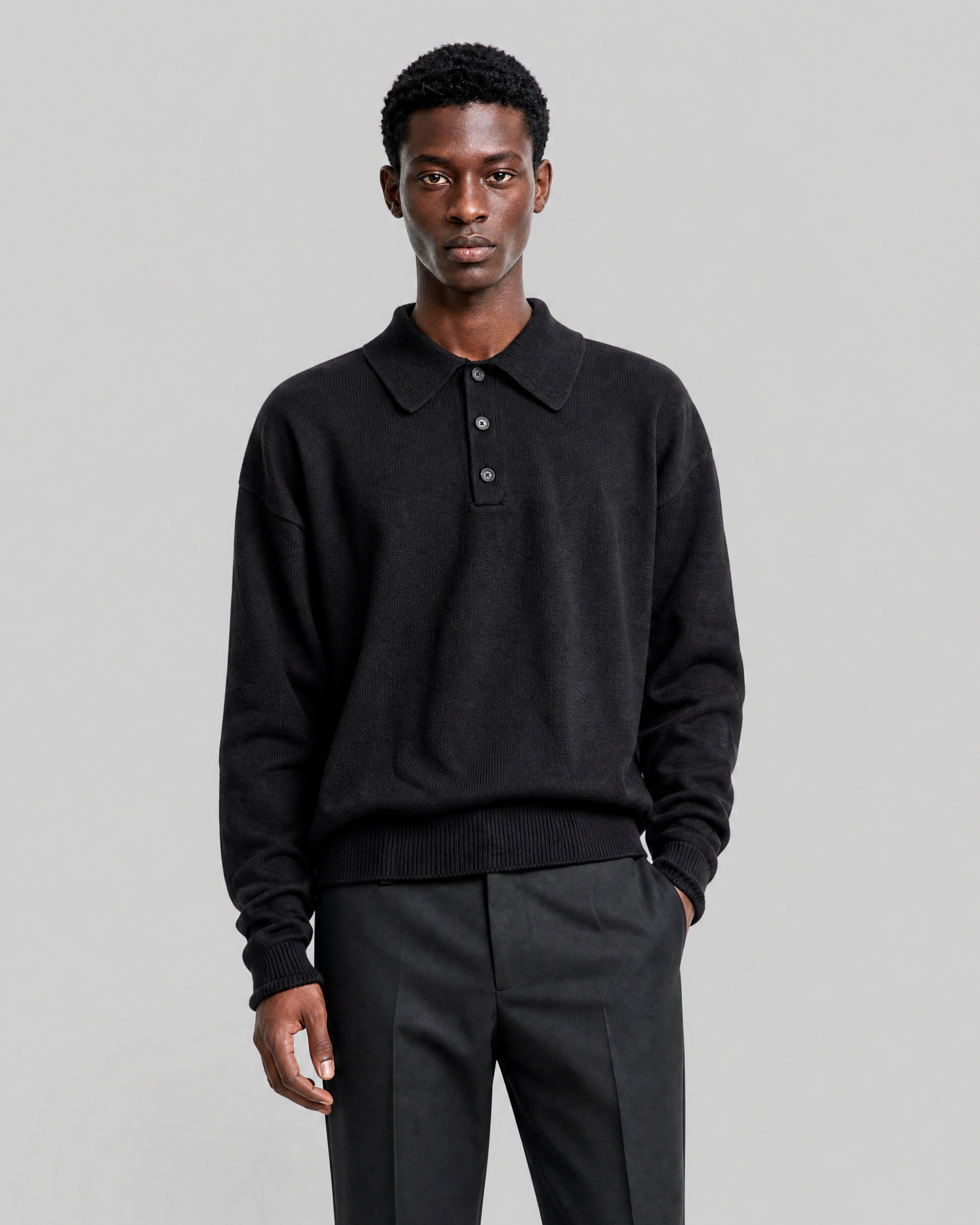 Black wool polo-neck sweater