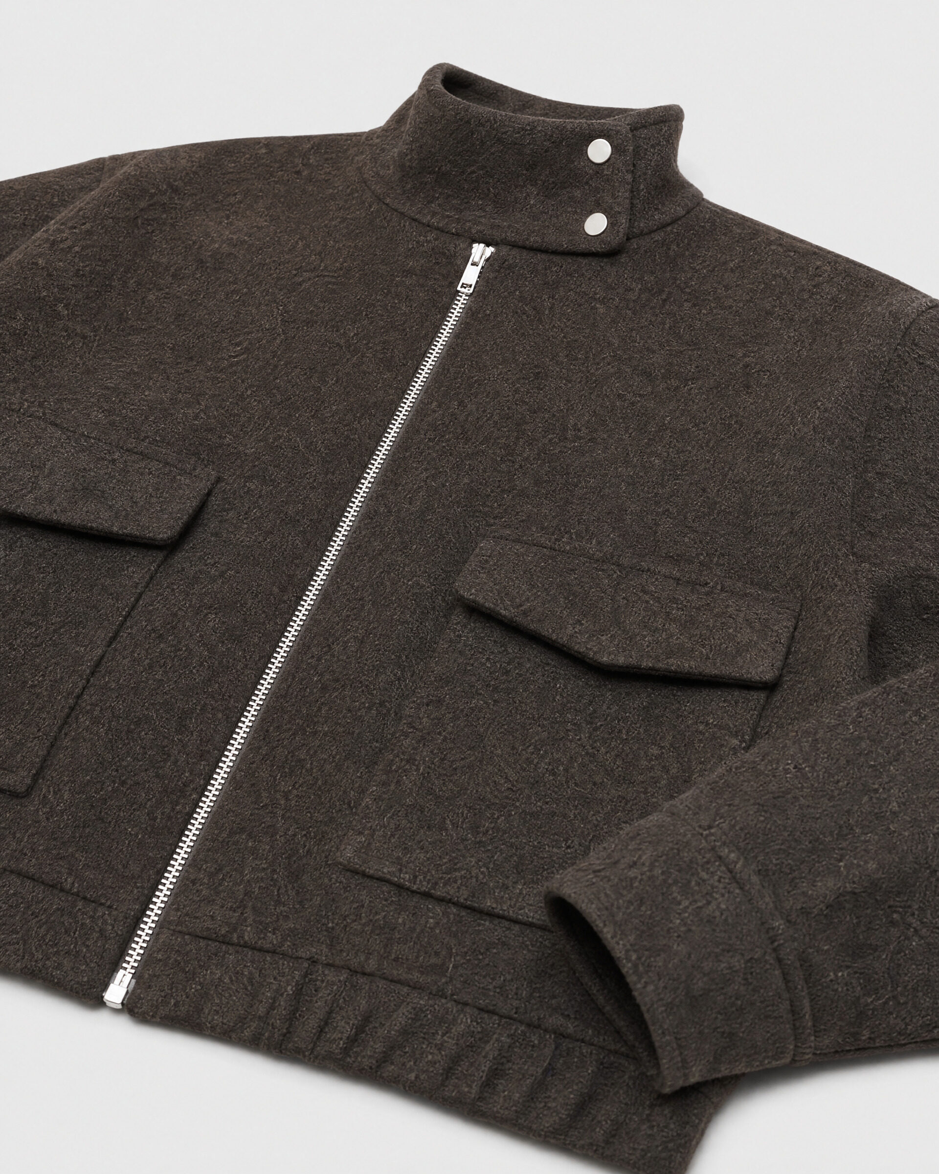 Brown wool jacket with a high collar