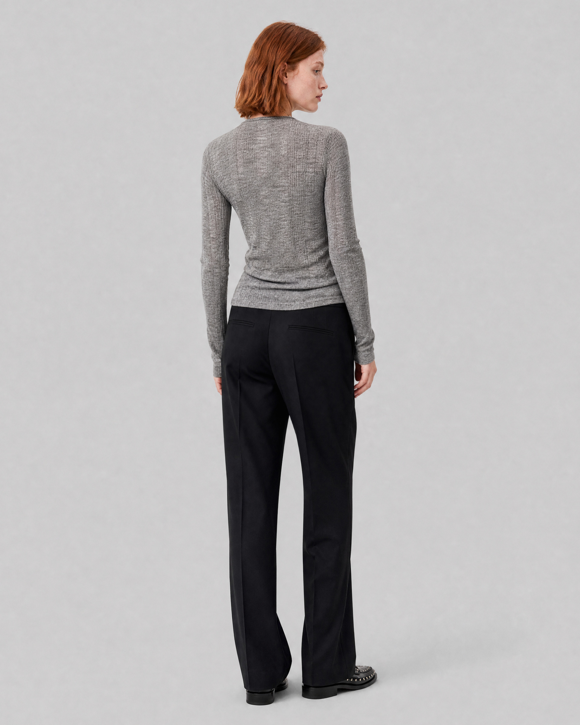 Black, fitted wool suit pants