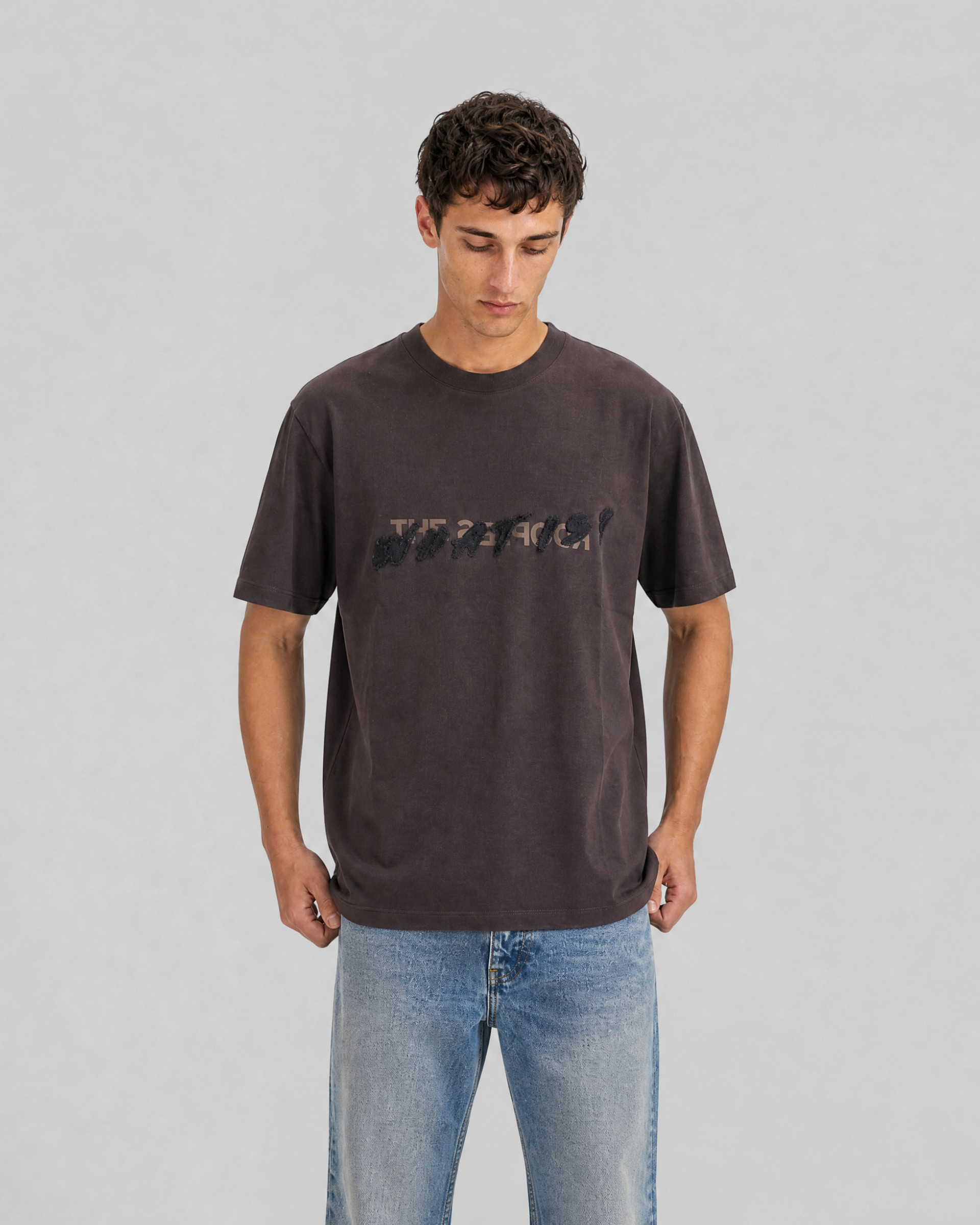 What is brown denim patch t-shirt