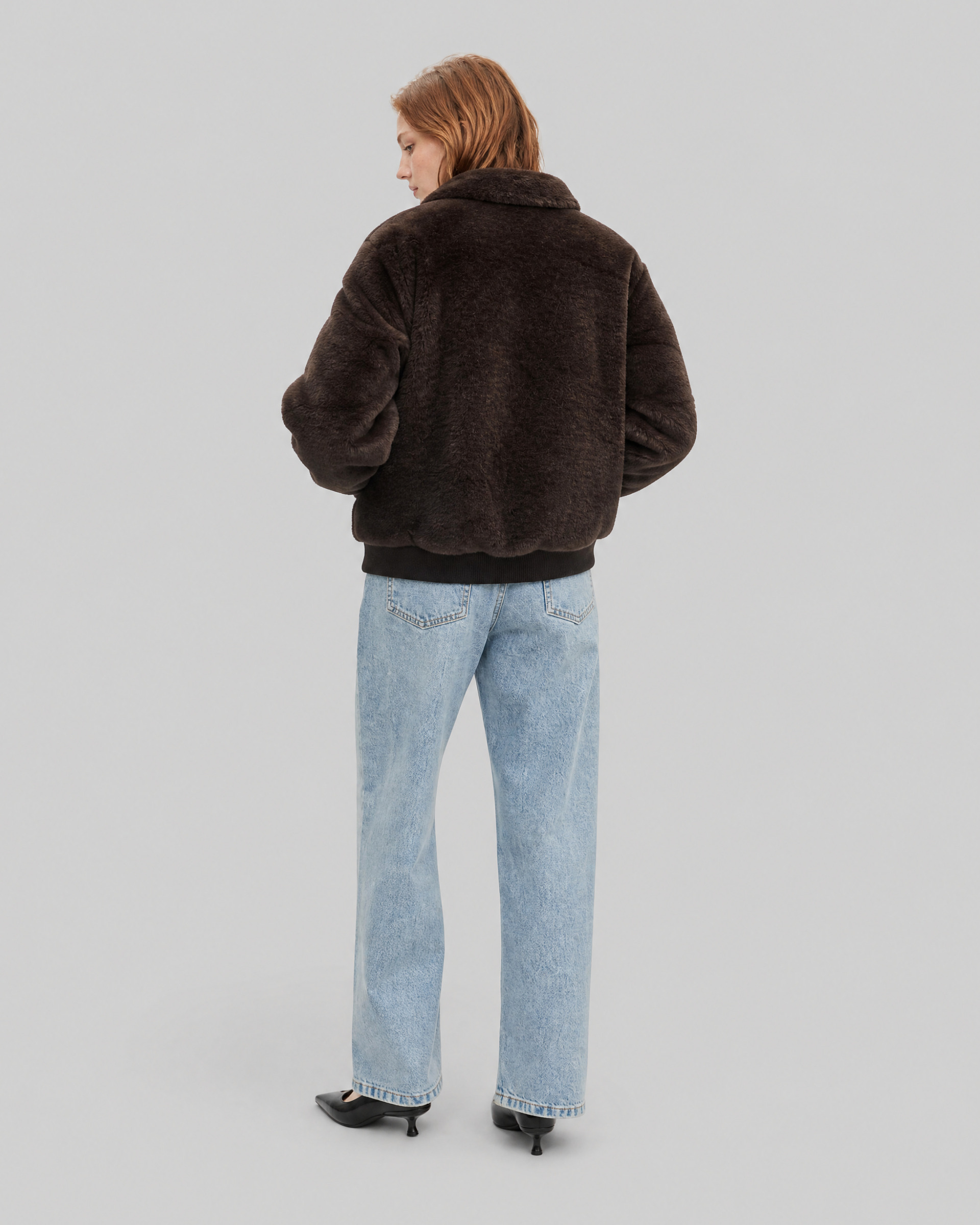 Brown faux fur coat with a zipper