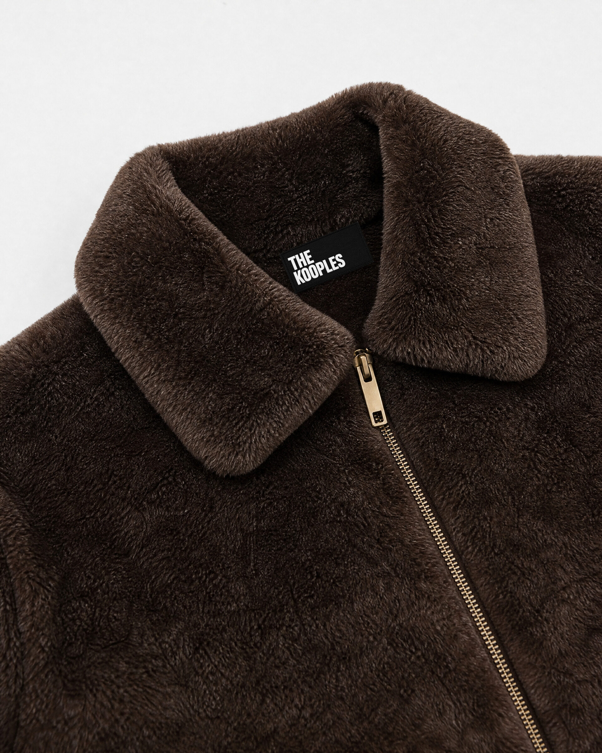 Brown faux fur coat with a zipper