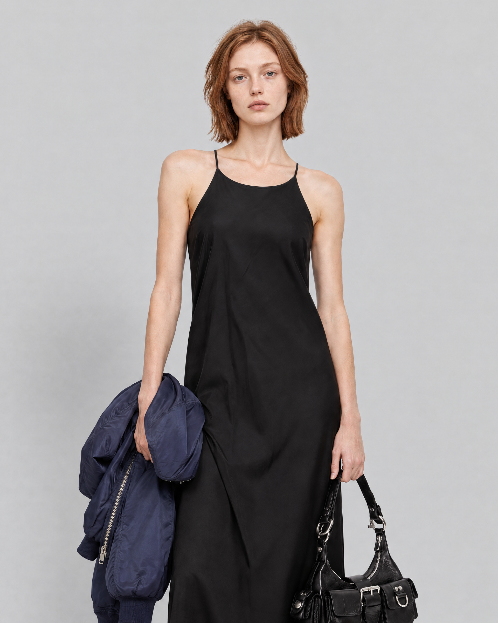Long black satin dress with a crossover back