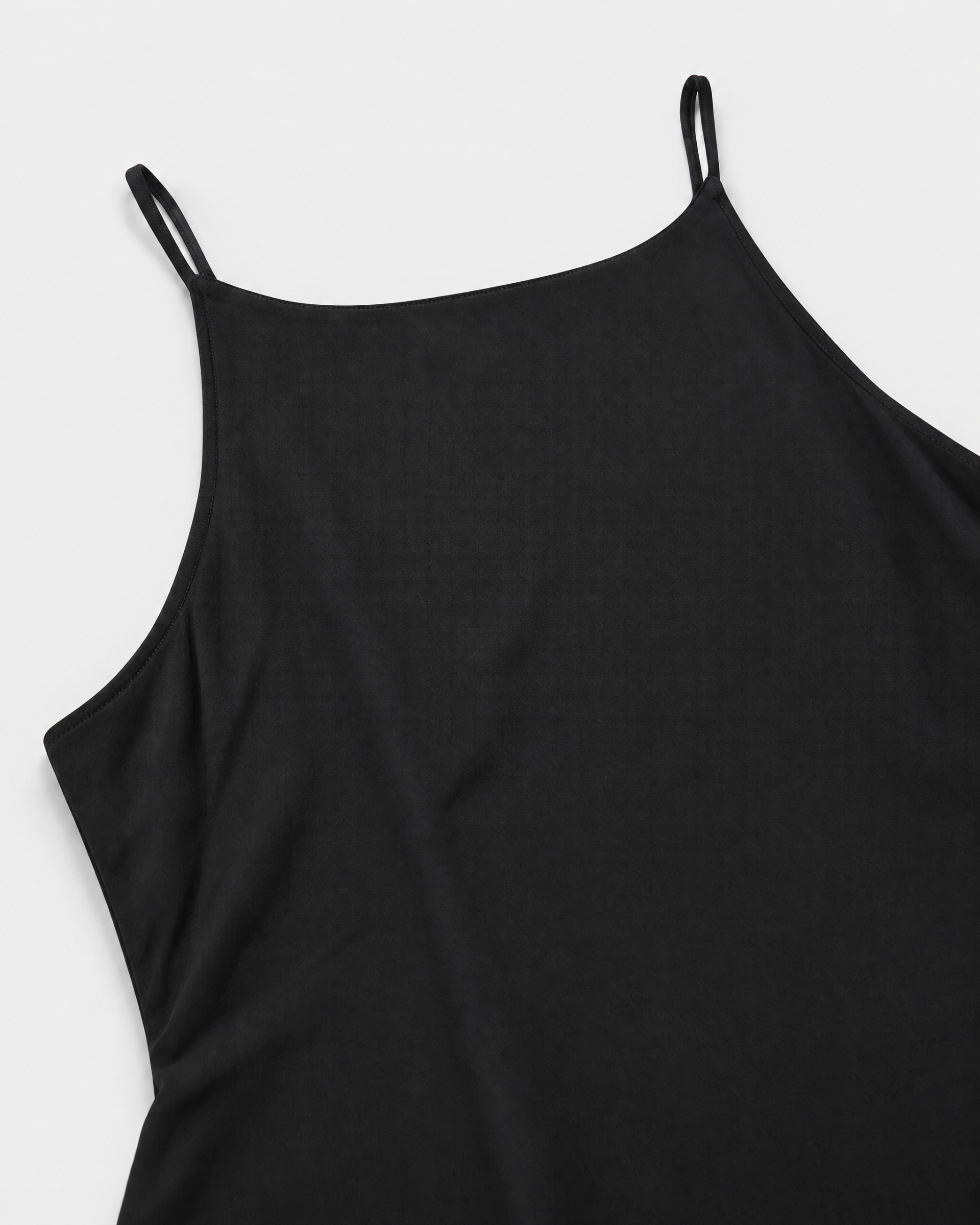 Long black satin dress with a crossover back