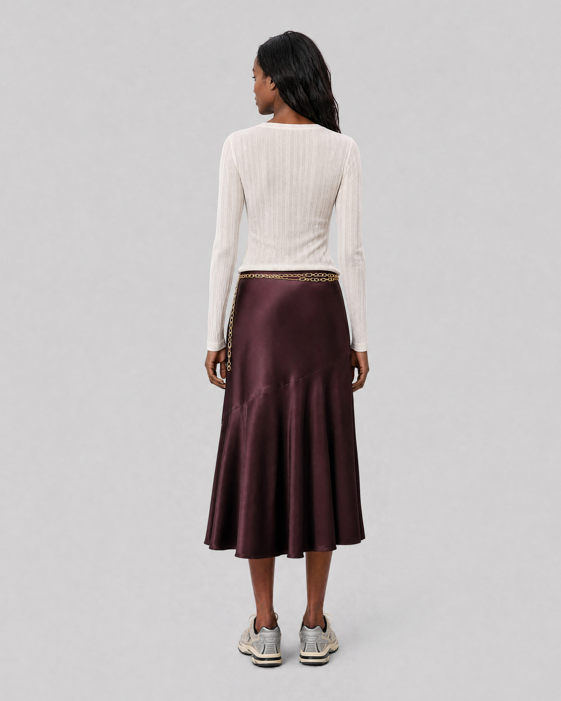 Satin midi skirt with a brown and gold chain